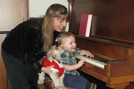 Donna Rhodenizer and Boy at Piano