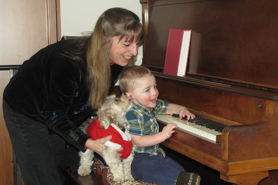Dog and Boy at Piano